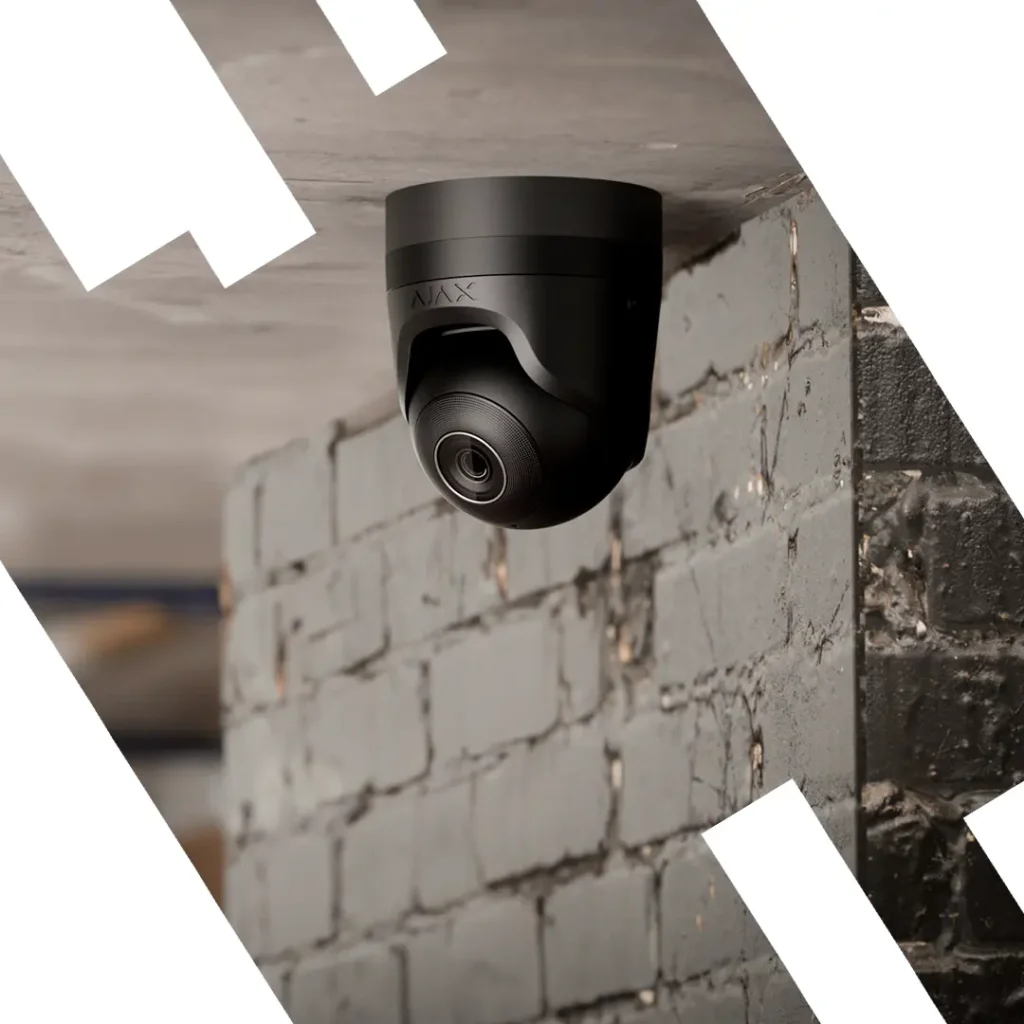 Outdoor CCTV camera installed on a brick wall in Melbourne