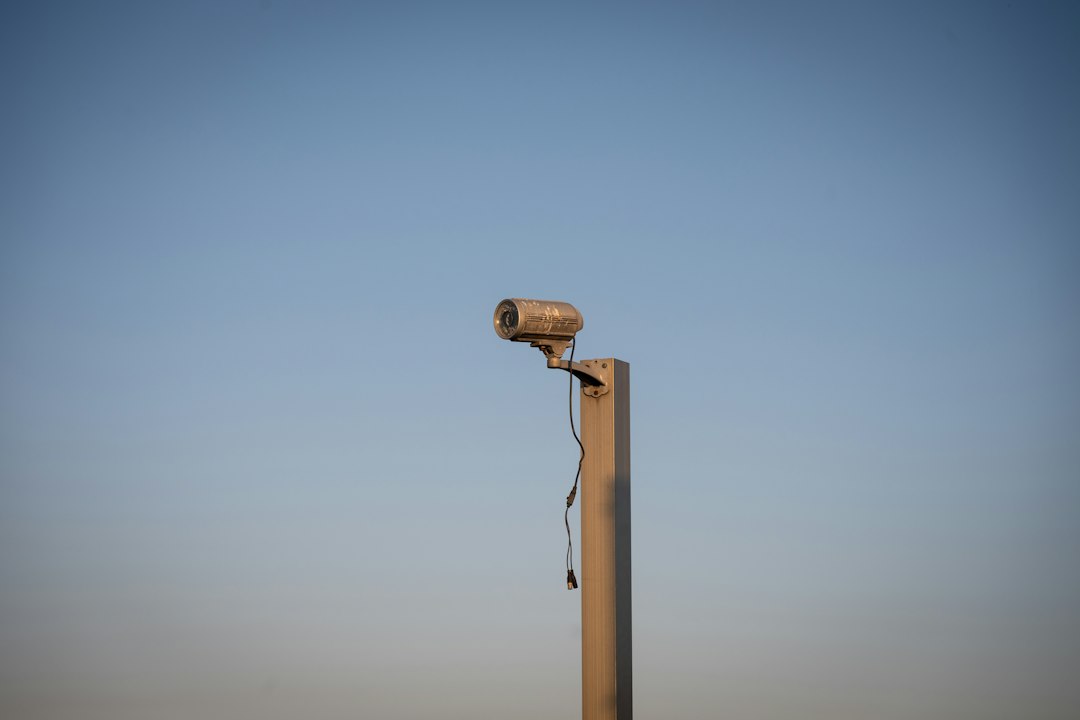 battery-solar-security-cameras-renters-camera-on-pole - SIPKO Security Battery-powered wireless security camera mounted on a pole, no wiring needed