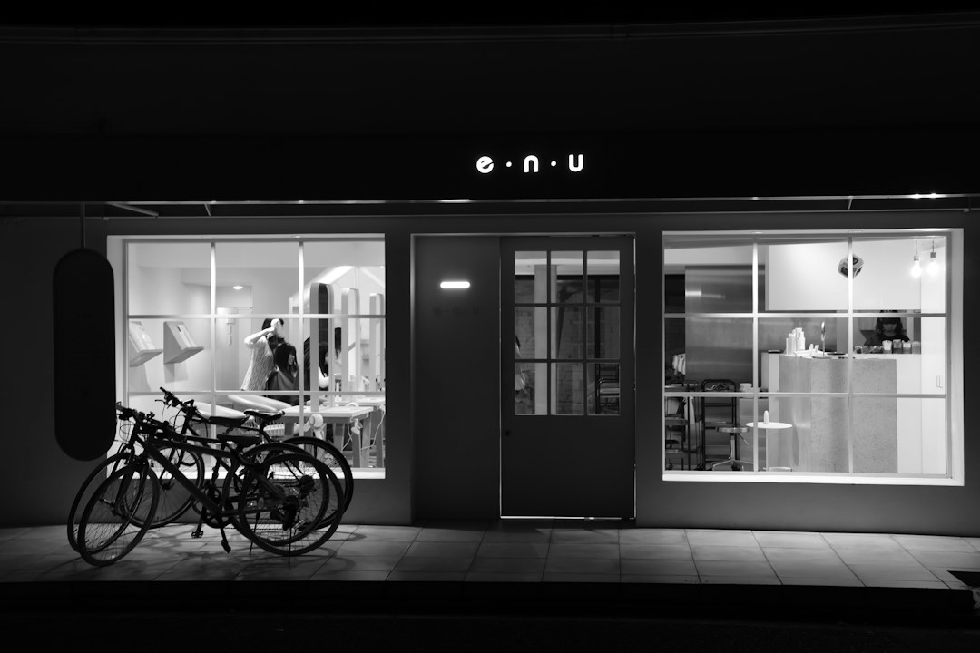 dahua-6mp-small-shop-interior - SIPKO Security Hairdresser styling a client during evening business hours in a small salon