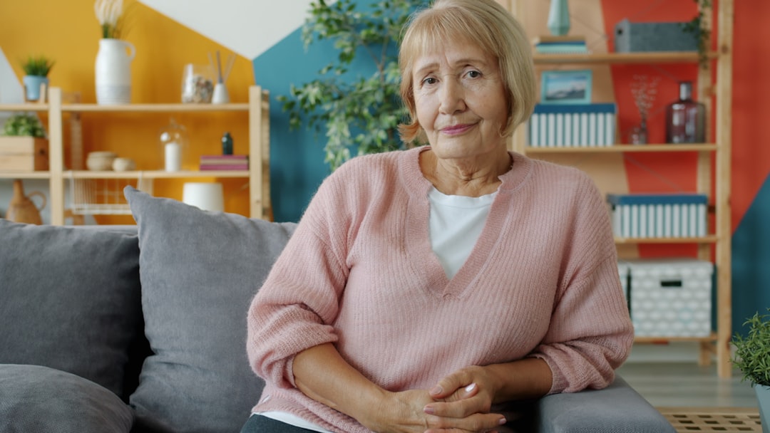 Senior woman sitting comfortably at home in Melbourne