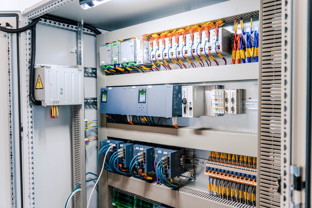 upgrade-or-replace-hardwired-alarm-wiring-reusable - SIPKO Security Open electrical control panel showing wiring and modules that can be reused