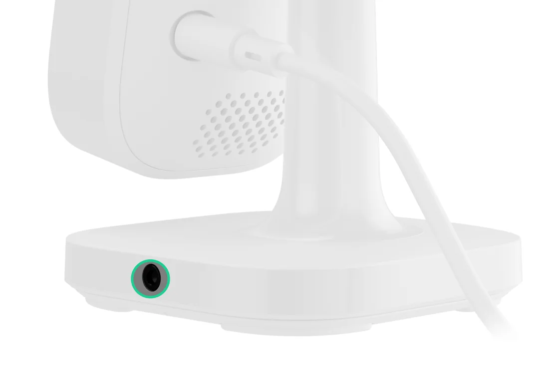 Close-up of the AJAX IndoorCam stand showing the holding screw that secures it to the mounting panel (white model shown)