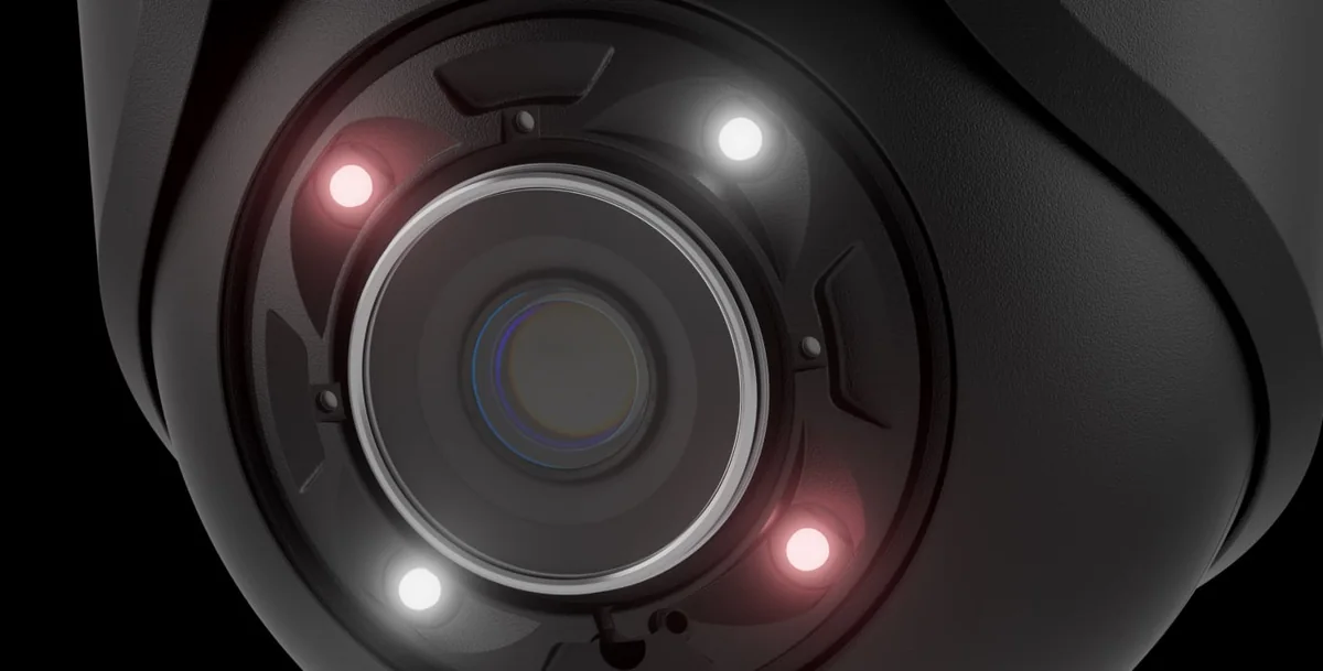 Close-up of the AJAX TurretCam HL lens with its IR LEDs and white LEDs for hybrid illumination (black model shown)