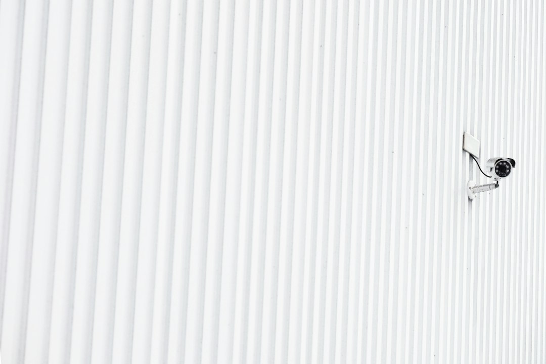 ajax-vs-dahua-airshield-camera-integration - SIPKO Security Outdoor security camera mounted on an exterior wall