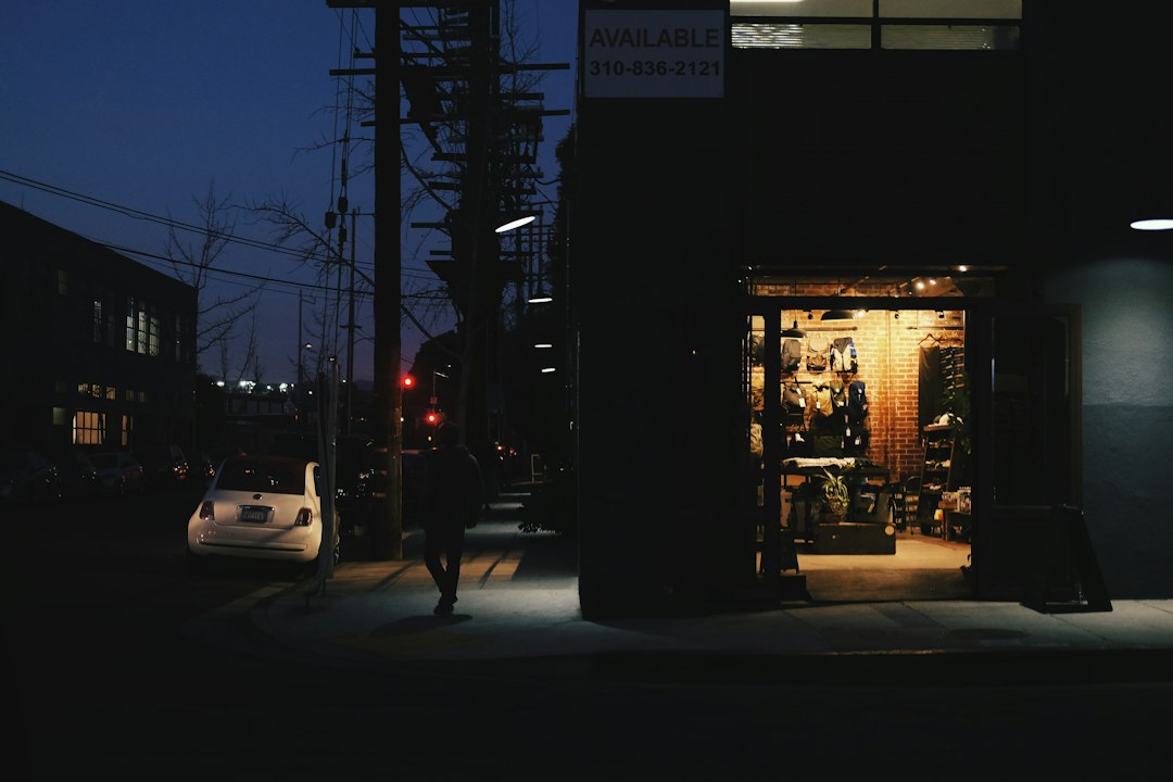 dahua-wizsense-vs-tioc-shopfront-night - SIPKO Security Shop storefront lit up on the street at night