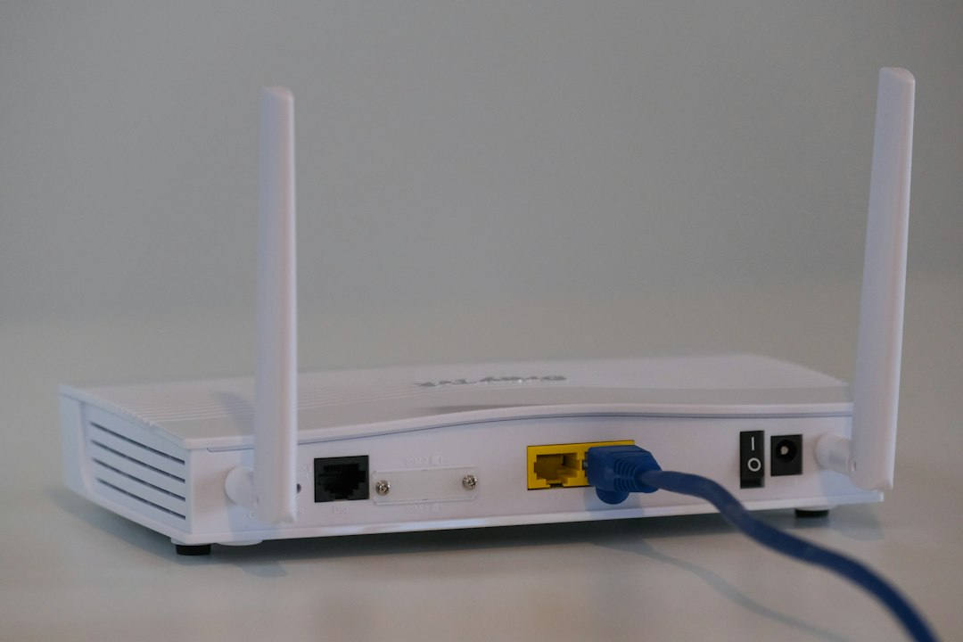 home alarm without wifi or internet - router and ethernet cable - SIPKO Security Broadband router with an Ethernet cable plugged into its back panel