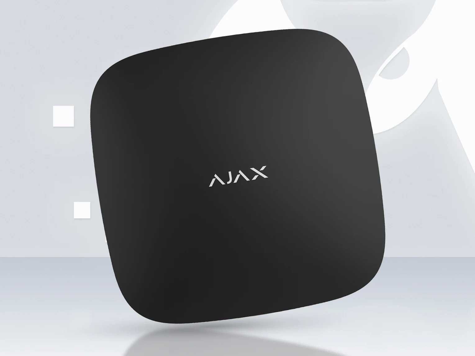AJAX Hub 2 Plus control panel in black on a light background with the Ajax logo