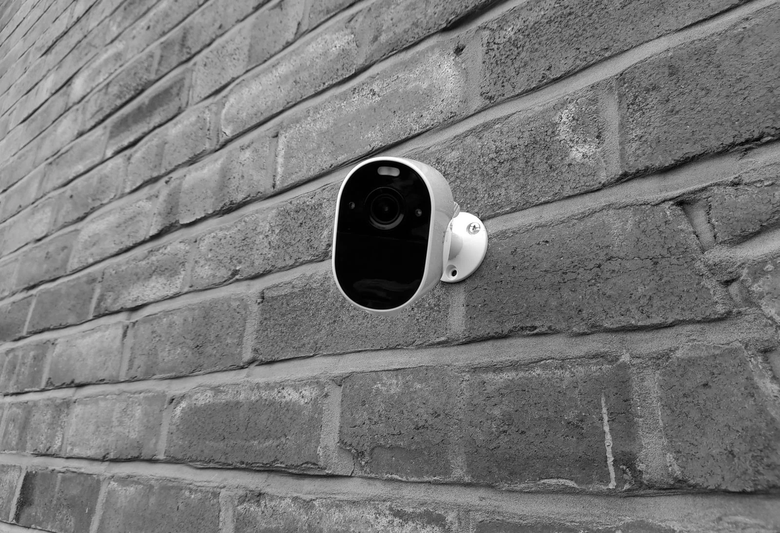 Wall-mounted CCTV camera shown in black and white - SIPKO Security Wall-mounted CCTV camera shown in black and white