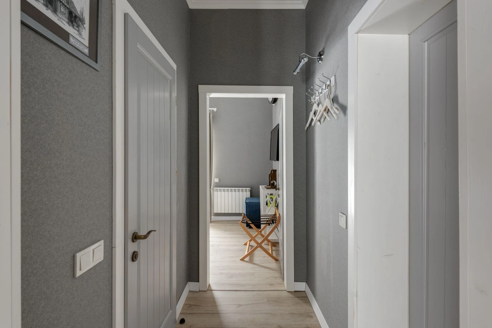 Quiet hallway with interior doors, the kind of route a night mode has to allow
